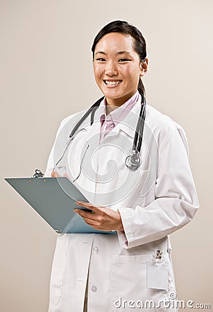 Confident doctor wearing lab coat Stock Photo