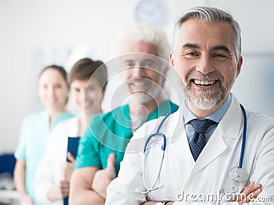 Confident doctors posing at the hospital Stock Photo