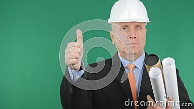 Confident Engineer Thumbs Up with Green Screen in Background Stock Photo