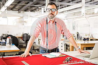 Confident fashion designer at work Stock Photo