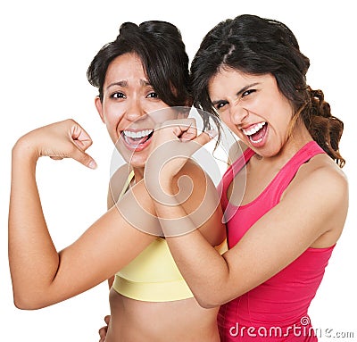 Confident Fit Women Flexing Stock Photo