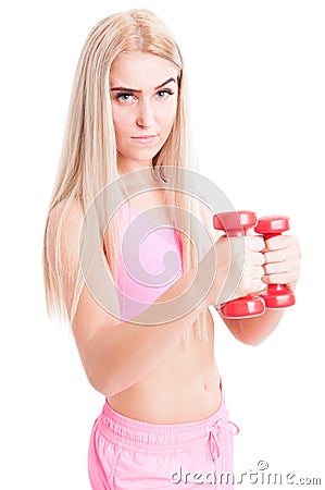 Confident fitness or aerobic girl holding weights Stock Photo