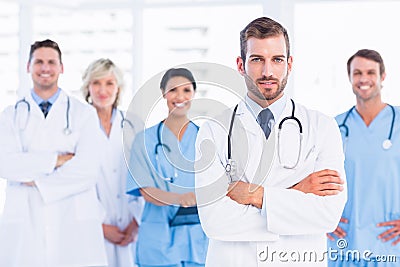 Confident happy group of doctors at medical office Stock Photo