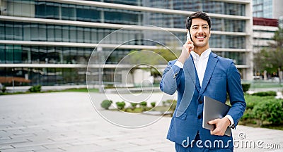 Confident Hispanic businessman in suit Stock Photo