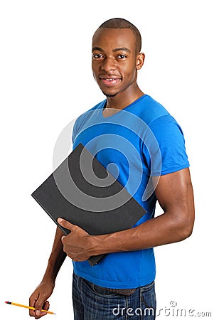 Confident male student holding a folder and pencil Stock Photo