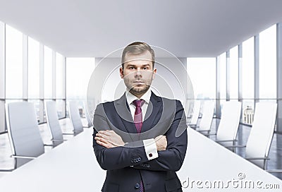 Confident man with crossed hands. Panoramic meeting room. New York view, Stock Photo