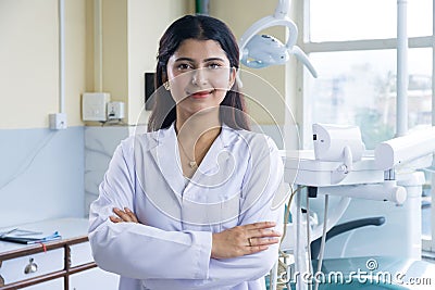 Confident Nepali Doctor Female Asian Standing in a Dental Hospital Stock Photo