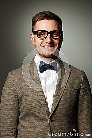 Confident nerd in eyeglasses and bow tie Stock Photo
