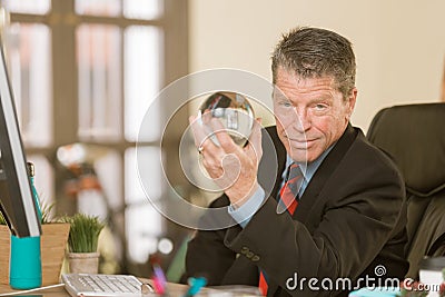 Confident Professional Man with Crystal Ball Stock Photo