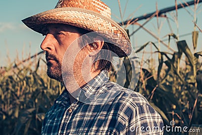 Confident serious farmer portrait in corn field Stock Photo