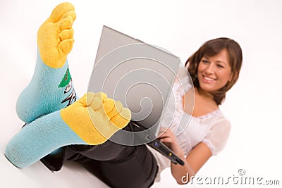 Confident smiling girl with laptop Stock Photo