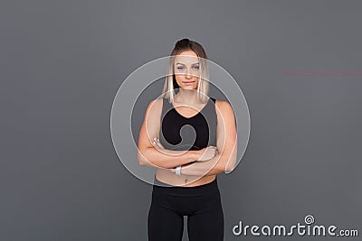 Confident sportswoman posing Stock Photo