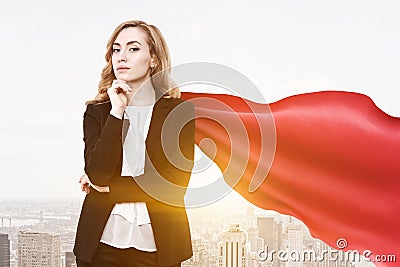 Superwoman businesswoman finance superhero, city Stock Photo