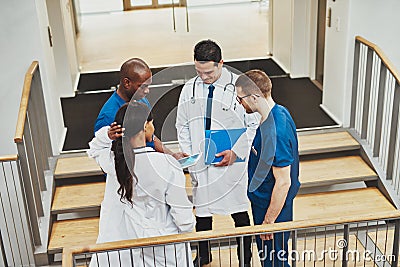 Confident team of doctors talking Stock Photo