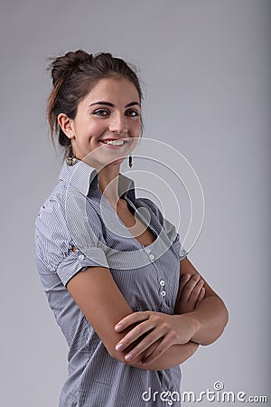 Confident woman, half-body portrait, smiling, arms crossed, busi Stock Photo