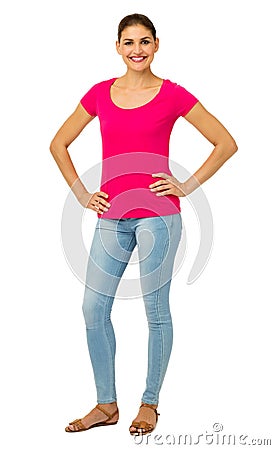 Confident Woman Standing With Hands On Hips Stock Photo