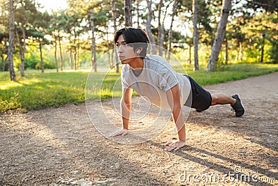 Confident young asian athlete man wearing sportswear Stock Photo