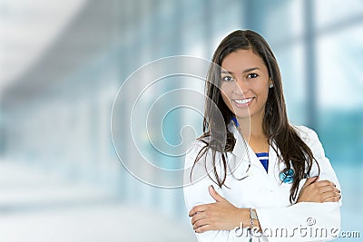 Confident young female doctor medical professional in hospital Stock Photo