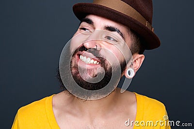 Confident young man with beard smiling Stock Photo