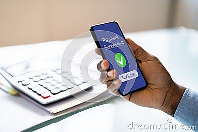 Confirmed Online Rent Payment. African American Man Stock Photo