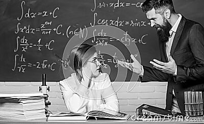 Conflict situation. School conflict. Demanding lecturer. Teacher strict serious bearded man having conflict with student Stock Photo