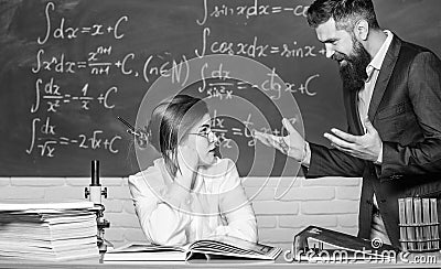 Conflict situation. School conflict. Demanding lecturer. Teacher strict serious bearded man having conflict with student Stock Photo