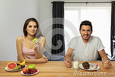 The confrontation of a healthy lifestyle and fast food Stock Photo