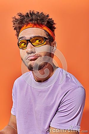confused african american fella in eyeglasses Stock Photo
