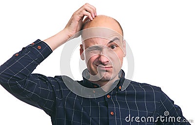 Confused bald guy scratch his head Stock Photo