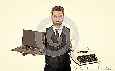 confused boss isolated on white. businessman hold vintage typewriter. Stock Photo