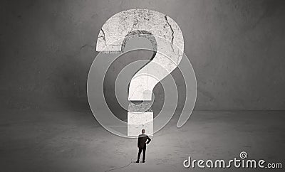 Confused businessman and big question mark Stock Photo
