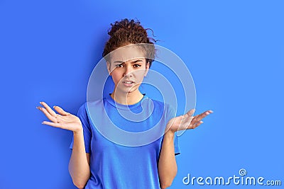 Confused caucasian girl is outraged by something Stock Photo