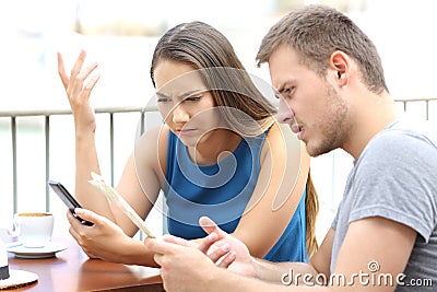 Confused couple of tourists searching location Stock Photo