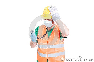 Confused doctor or medic wearing builder clothes Stock Photo