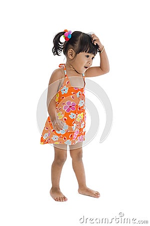 Confused girl scratching her head Stock Photo