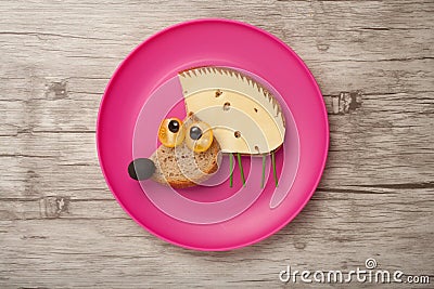 Confused hedgehog made of bread and cheese Stock Photo