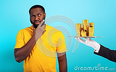 Confused man is suspicious about a financing or winning. concept of options, confusion, indecision Stock Photo