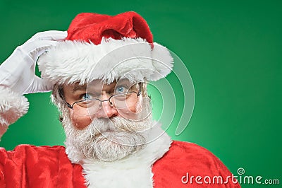 Confused Santa Claus Scratching His Head Stock Photo