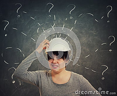 Confused woman engineer Stock Photo