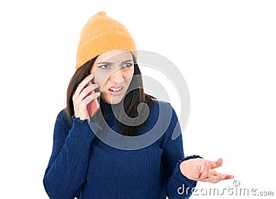 Confused young woman holding the phone, isolated on white background. Female person with smartphone. Nuisance concept Stock Photo