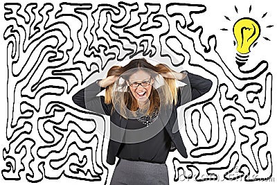 Confusion and stress. Maze and bulb. Reach the solution. Business woman stressed pulling her hair. Stock Photo