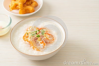 Congee with shrimps and fresh ginger Stock Photo