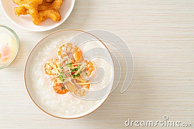 Congee with shrimps and fresh ginger Stock Photo