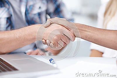 Congratulations are in order - Great job. two businessmen shaking hands. Stock Photo
