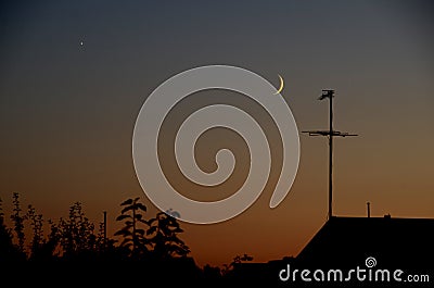 Conjunction between Moon and Venus Stock Photo