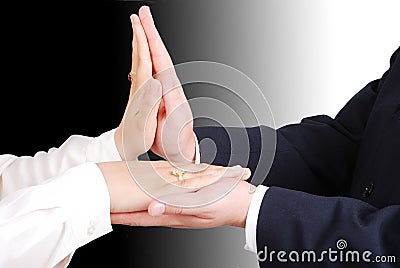 Connected hands of two young lovers Stock Photo