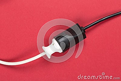 Connected white european power cable plug with black connector c Stock Photo