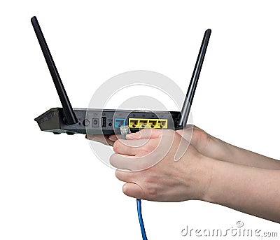 Connecting cable to router isolated on white Stock Photo