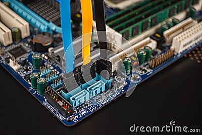 connecting hard drives and SSD drives in a computer using the SATA interface, choosing SATA2 or SATA3, connecting drives in a comp Stock Photo