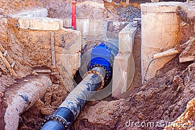 Connection of the construction of main city water blue supply pipeline. Stock Photo